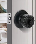 Stainless Steel Indoor Door Handle Lock Set With Key For Bedroom Or Bathroom Silent Single Tongue Latch Sleek Dope Modern Hardware Easy Install Built Tough For Everyday Home Use with black knob visible on a white door.