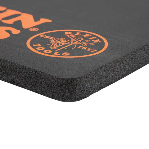 Close-up of 1 inch thick NBR foam kneeling pad, showcasing soft closed cell comfort for tradesmen with branding detail.
