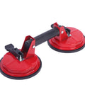 Heavy Duty Vacuum Suction Cups Badass Dual Claw Glass Tile Lifter with red handles and flexible rubber lips for easy grip.