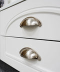 10 Pack 3 Inch Cabinet Cup Pulls In Brushed Nickel For Kitchen Cabinets And Furniture installed on white drawers
