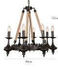 Rock Solid Industrial Chandelier Features Woven Hemp Rope And Sturdy Metal Candle Holders To Set A Chill Farmhouse Vibe