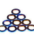 Badass Grade 5 Titanium Flat Washers For M5 Metric Bolts With Burnt Blue Finish 10 Pack angled display of washers with glossy finish