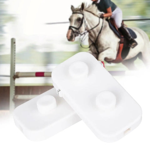 2X Breakaway Jump Cup Adapters For Horses With Locking Latches And Automatic Release in front of horse jumping obstacle