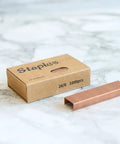 Box and strip of Rose Gold Staples Refill Kit With 7000 Premium 26 By 6 Standard Size Staples, 12mm Width, 7 Box Pack