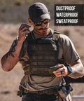 Person at shooting range wearing tactical gear with waterproof, dustproof, and sweatproof features.