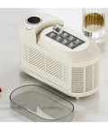 Slick Countertop Ice Maker, Portable Mini Electric Machine Making Crisp Fresh Cubes Fo Sho Fast For Home Bars And Weekend Getaways With Energy Efficient Cooling And Simple One Button Operation on countertop with ice cubes.