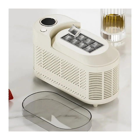 Slick Countertop Ice Maker, Portable Mini Electric Machine Making Crisp Fresh Cubes Fo Sho Fast For Home Bars And Weekend Getaways With Energy Efficient Cooling And Simple One Button Operation on countertop with ice cubes.