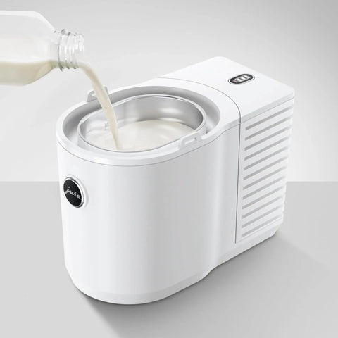 Hella Sleek Chilling Unit Featuring Solid Aluminum Cover And Hygienic Design keeps drinks ice cold with milk being poured.