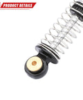 Close-up of silver alloy 47mm SCX24 shock with coil spring for Axial One Twenty Four RC crawler upgrade