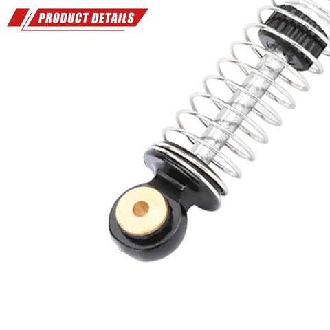 Close-up of silver alloy 47mm SCX24 shock with coil spring for Axial One Twenty Four RC crawler upgrade