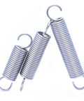 Built Tough 10 Pack Of Premium 304 Stainless Steel Tension Springs With Open Hooks For Shock Absorption And Quick Gear Repairs 4Mm Outer Diameter 120Mm Long image showing three tension springs with hooks.