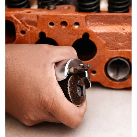 Pro Grade Stud Extractor Tool For Removing Broken Or Seized Studs And Damaged Bolts From One Quarter To Three Quarters Inch With Cam Action Grip in use