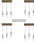 Three Light Wooden Pendant Light With Height Adjustable Clear Bottle Glass Shades, showcasing height variations.