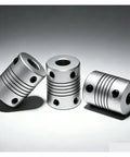 Top Tier Flexible Jaw Shaft Coupling D19 By L25 Inches With 3/6.35/8/10mm Bore Fits Stepper Motors And Encoder Gear For Engraving Machines In Great Condition! Silver aluminum couplings displayed in different angles.
