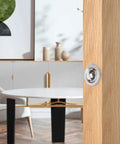 Close-up of Heavy Duty Adjustable Door Ball Catch Set in Brushed Nickel installed on wooden door, showing ball catch