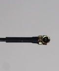 Close-up of Ultra Light 3 Pack 5.8 GHz UFL Dipole FPV Antenna Set with IPX/U.FL connector in black.