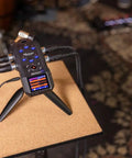 Essential Handheld Recorder For Musicians, Podcasters, And Filmmakers With Built-In X Y Mics on a stand in a recording studio