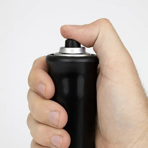 Person holding a Heavy Duty Remote Starter Switch For Cars And Trucks With Push Button Start for hands free cranking.