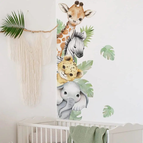 Jungle Safari Animal Wall Decals Set With Watercolor Elephants Lions Monkeys Kid Friendly Sticker Kit displaying a giraffe, zebra, cheetah, and elephant above a crib.