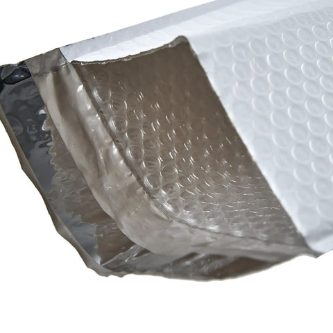 Close-up of open white bubble padded poly mailer bags 9.5 x 13.5 inches self seal opaque envelopes tear proof water resistant