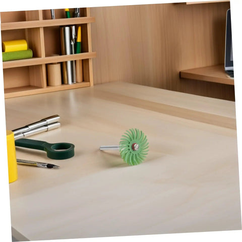 Radial Bristle Disc For 3Mm Shank Kit With 1 Inch Rotary Tools and Small Spiral Flap Wheel on a wooden desk.