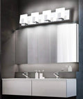 Over Mirror Vanity Lights Three Light Modern Chrome Fixture for Bathroom Stainless Steel Frame with Acrylic Shade displayed above mirror