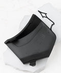 BMW X3 G01 2018-2021 Front Bumper Tow Hook Eye Cover Cap OEM Replacement 51117399897 in black on marble surface