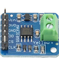 Close-up of K Type Thermocouple Sensor Module With MAX31855 SPI Interface And Direct Digital Temperature Output on a blue circuit board.