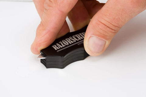 Precision Adjustable Carpentry Scribe Tool With Integrated Stud Detector Featuring Dead On Marking Blade, handheld for fine marking.