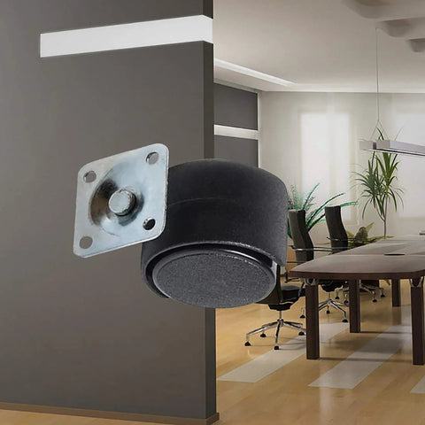 Black nylon furniture caster set with mounting plate shown in office setting