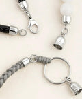 Silver Tone Leather Cord End Caps 4mm To 12mm For Jewelry Making And Kumihimo Easy Glue In Cylinder Ends With Loops shown attached to cords