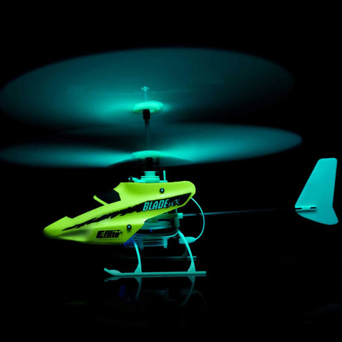 MCX Anniversary Edition RC Helicopter Ready To Fly Indoor Ultra Micro Flyer For Bedrooms And Living Rooms glowing in flight