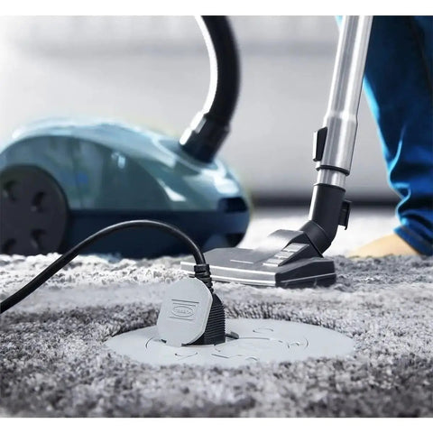 Round Floor Box Cover Kit Nonmetallic With Two Lift Lids for Hubbell Raco 5511 Floor Box in use, showing gray cover on carpet.