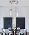 Integrated Six Light Brushed Nickel Ceiling Light Fixture With Crystal Bubble Cylinders, Dimmable 6000K, mounted above a dining table.