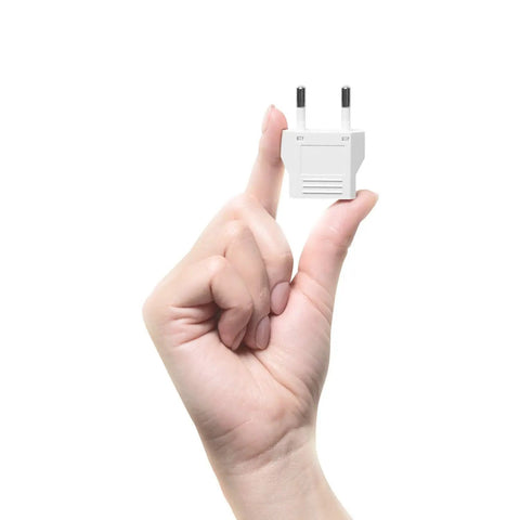 Hand holding compact white European Travel Plug Adapters For Jetset Trips US To Europe Type C Converters 8 Pack