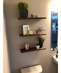 Wall with wood shelves reinforced by Heavy Duty Cast Iron Shelf Brackets 3 Inch L Shape Corner Braces Black Steel Wall Mounts With Screws