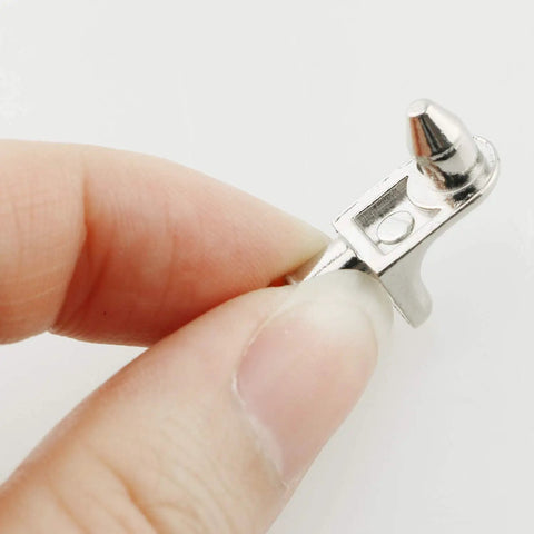 Built Tough Steel Shelf Support Pegs With 5mm Pins 10 Pack Heavy Duty Cabinet Hardware for Kitchens and Bookshelves, close-up view.