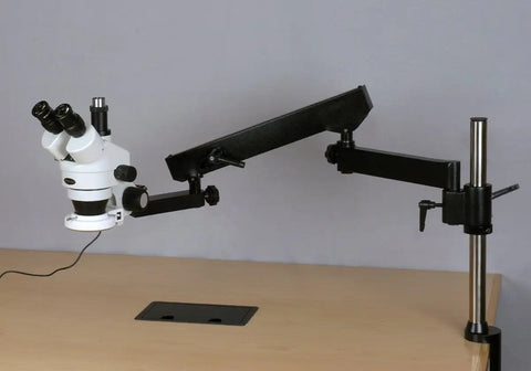 3.5X to 90X Zoom Stereo Microscope on an Articulating Arm with 144 LED Illumination and a 10MP Digital Camera, USB Two Point Zero Output, A Real Workhorse for Inspecting Circuit Boards and Dental Appliances. White stereo microscope on black articulating arm