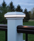 4.5 Inch Composite LED Deck Post Cap Light For Trex Transcend Posts, White Finish, illuminated at dusk on deck railing