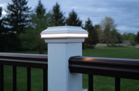 4.5 Inch Composite LED Deck Post Cap Light For Trex Transcend Posts, White Finish, illuminated at dusk on deck railing