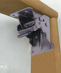 Close-up of a heavy duty self locking furniture hinge mounted on wood, part of a four pack for sturdy setups.