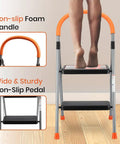 2 Step Folding Step Stool Ladder With 330Lb Heavy Duty Steel Frame, Anti Slip Wide Pedals And Cushioned Handgrip in use.