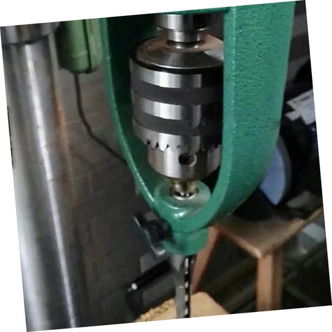 Iron Mortise Converter Runs Tight On Bench Drills with hollow chisel bits on a drill, showing clamp mechanism.