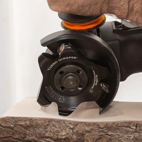 Knockout Turbo Scraper Wheel For Angle Grinders With Swivel Carbide Blades smoothing raw lumber with precision and ease.