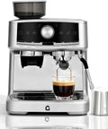 Sleek Stainless Steel Espresso Machine With Built In Grinder And Silky Milk Frother For Fresh Ground Magic And Zero Fuss Brewing Featuring 20 Bar Pressure And Large Reservoir Tank brewing espresso in a glass cup.