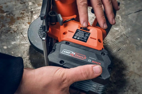 Built Tough Cordless Circular Saw For Spark Free Cold Cuts On Sheet Metal And Steel Pipe Works Like A Charm With Standard 18V Packs, close-up of battery connections.