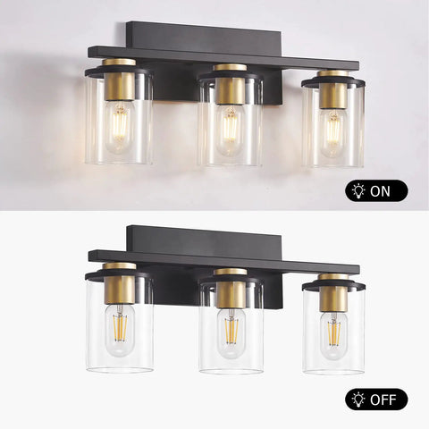 3-Light Black And Gold Bathroom Vanity Lights With Glass Cylinder Sconces For Wall Mounted Bathroom Lighting, on and off views