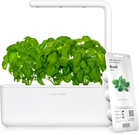 Indoor Herb Garden Kit With Grow Light For Kitchen Windowsill, includes three basil pods in a self-watering white planter
