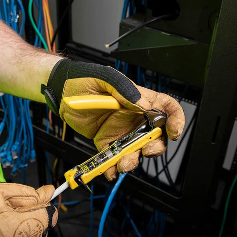 Technician installing Universal BNC Compression Coax Connector for RG6 cables with universal sleeve in telecom rack