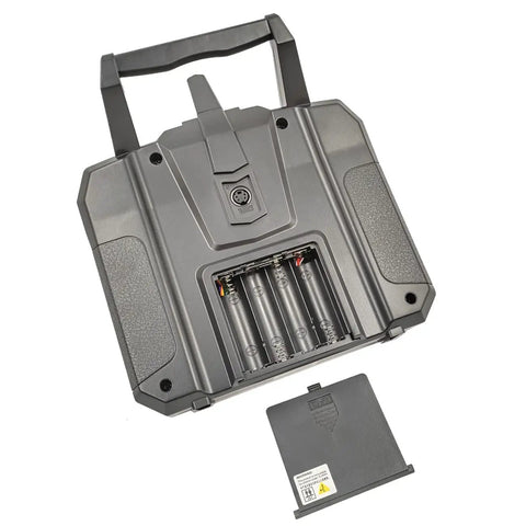 Back view of Six Channel 2.4GHz RC Transmitter showing battery compartment with open cover and batteries removed